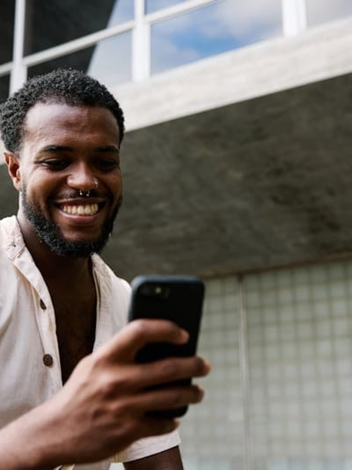 Person happily using Aurra on their phone